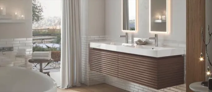 Krion — Solid surface: seamless worktops, integrally moulded basins, shower panels.