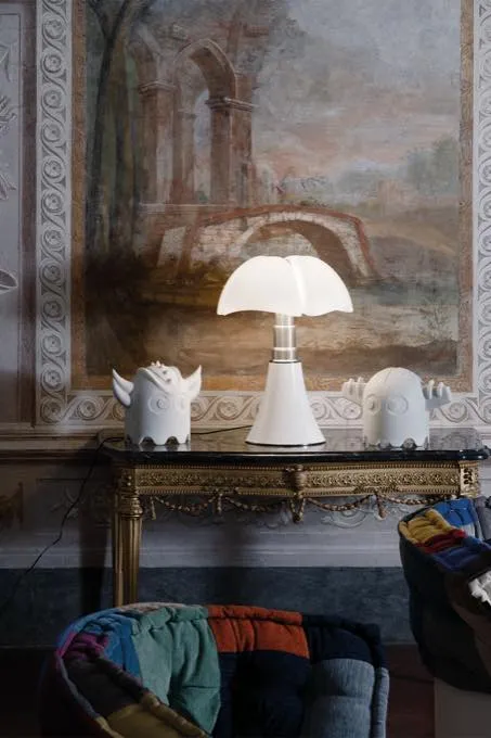 Martinelli Luce — Designer lighting, including Gae Aulenti’s Pipistrello. The statement piece of a lobby.