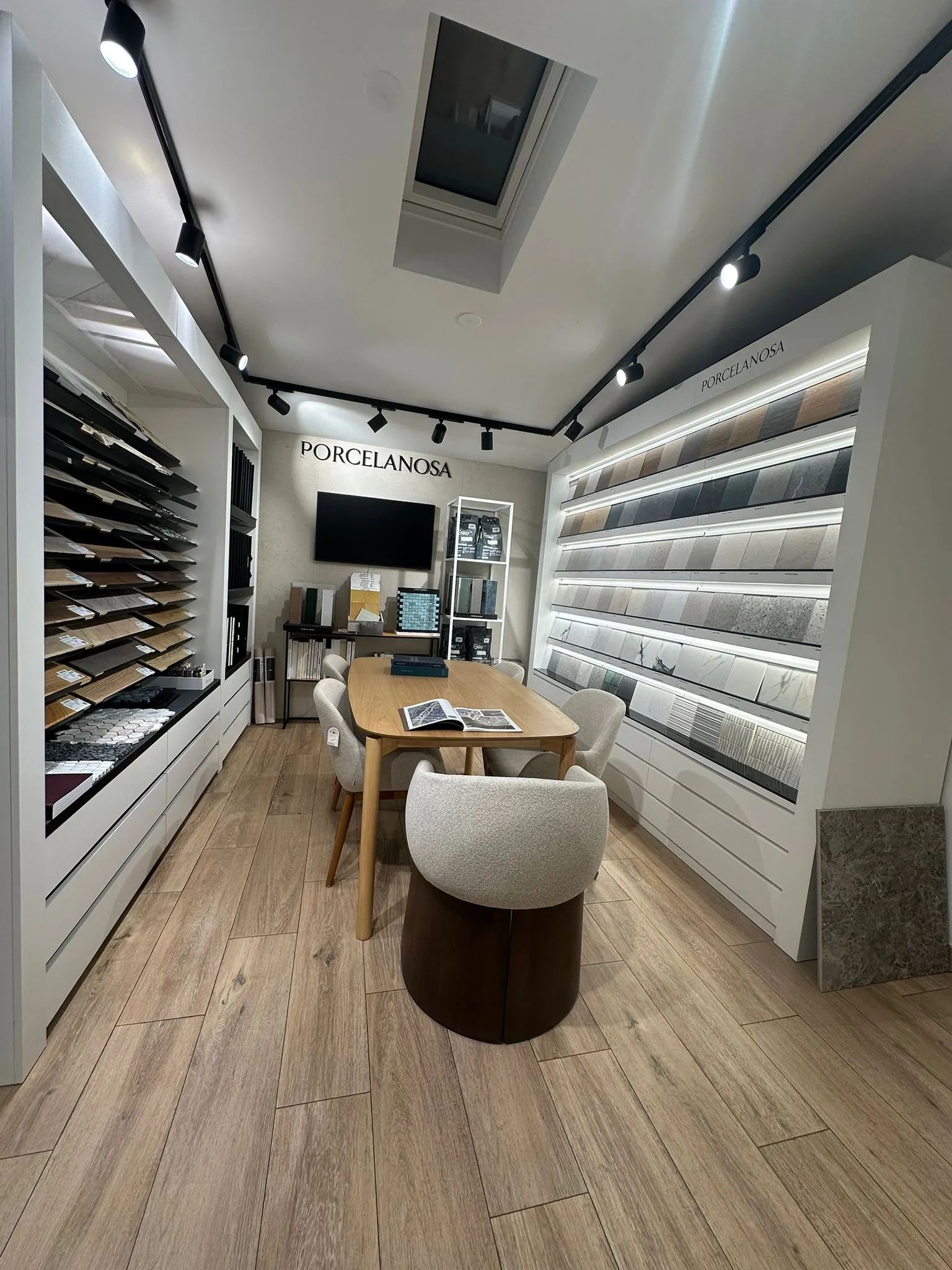 Wall of tile and stone samples, sorted by format